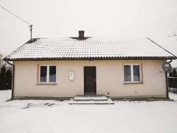 Wzgórza, cisza i ogień w kominku