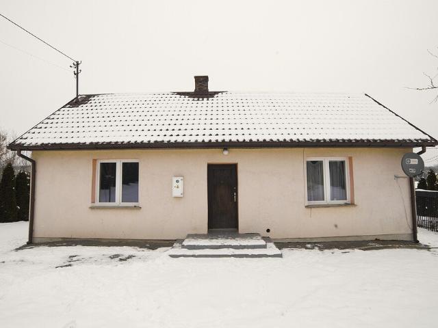 Wzgórza, cisza i ogień w kominku
