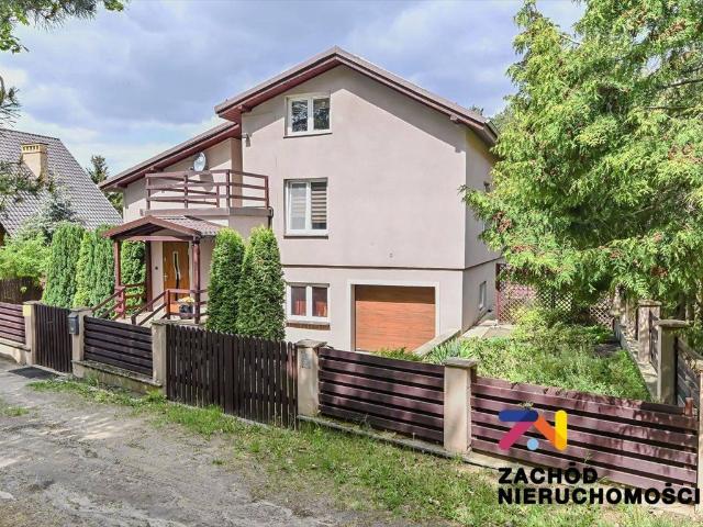 Przestronny dom z ogrodem, PV i garażem w Raculi