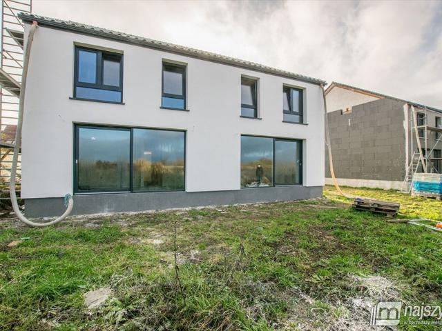 Zapraszam do obejrzenia domu bliźniaczego 105 m² z garażem i pompą ciepła
