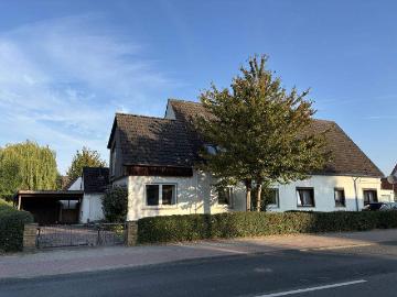 PURNHAGEN IMMOBILIEN Großzügige Doppelhaushälfte mit Wintergarten auf großem Grundstück