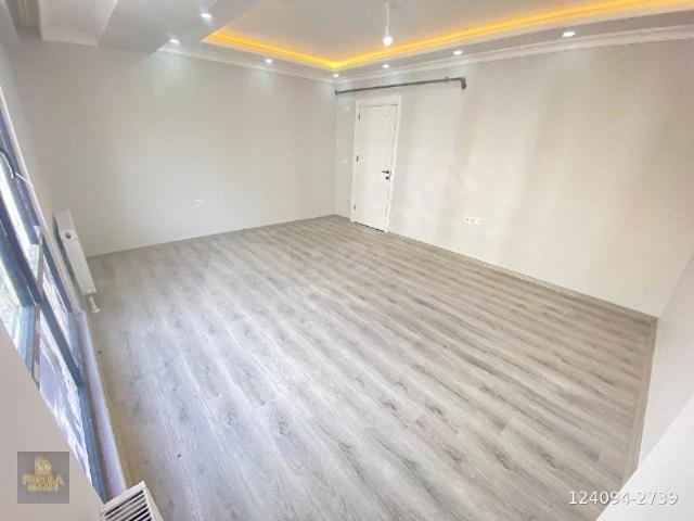 PUSULA İNŞ.TAN MALKOCOGLU MAH CADEYE YAKIN 100M2 1KAT DAİRE