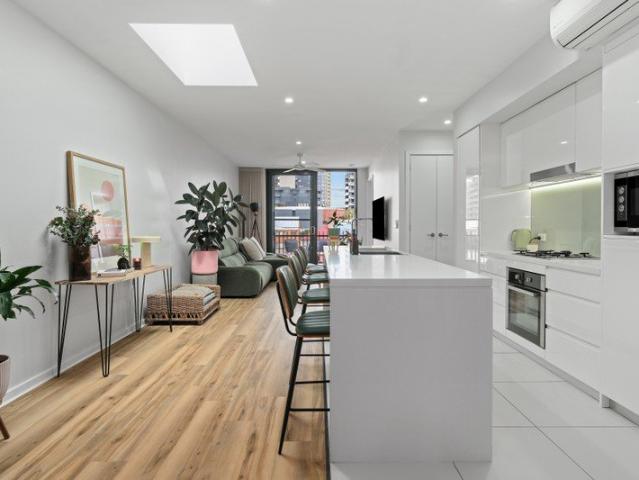 Put simply, light filled inner city living with style, space and cityscape views