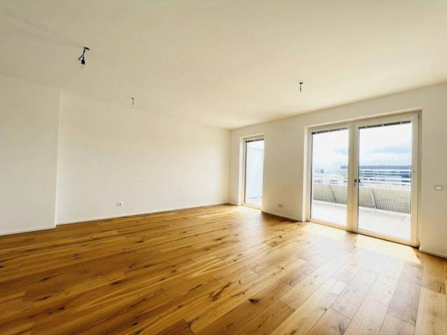 Q11 Urbanes Wohnen im Penthouse. Leben im Grünen
