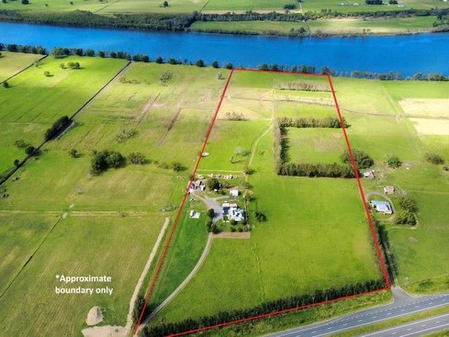 QUALITY ACRES ON THE MANNING RIVER