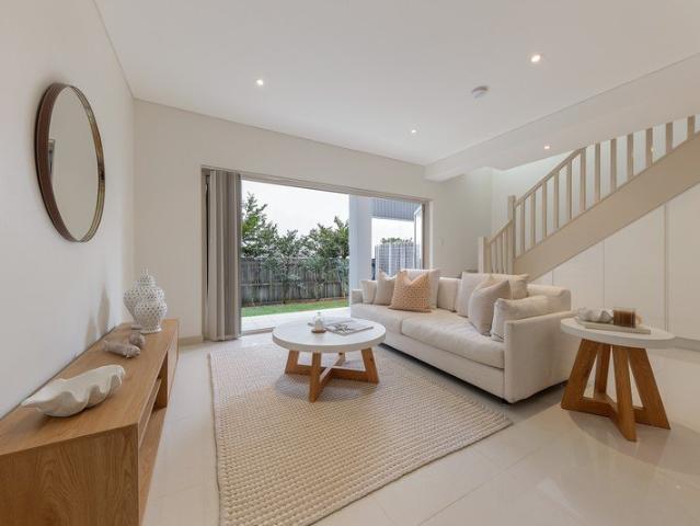 Quality built townhouse in a walk to everything location