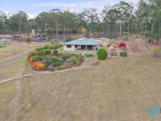 Quality brick home on approx. 3 acres with shed and caravan storage