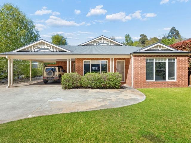 Quality Brick Living with Mountain Views & the Ultimate Mancave