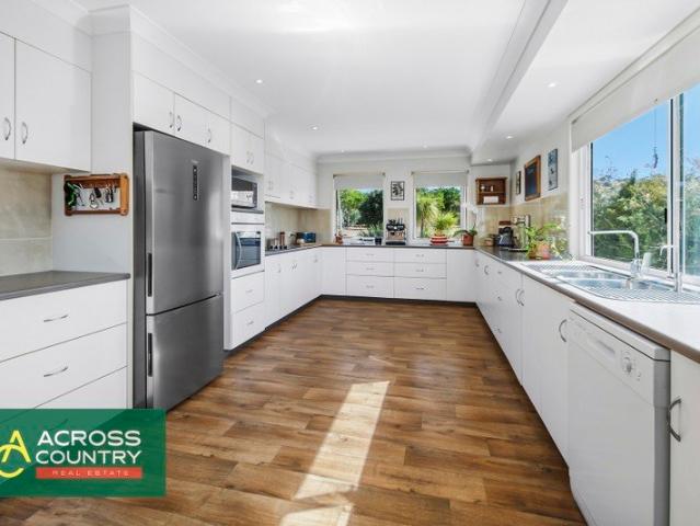 Quality, comfort and exceptional outdoor living in a peaceful area of town