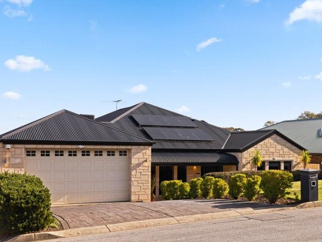 Quality, contemporary family living surrounded by foothill's serenity