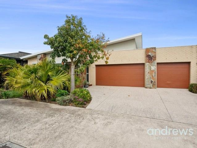 Impressive home with 3 car garage as well