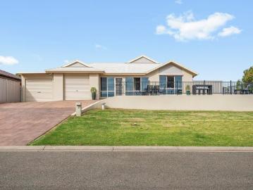 Quality Family Home Adjacent to Wide Open Green Space and Trails
