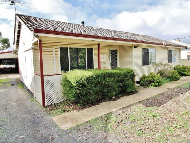 QUALITY FAMILY HOME WITH A HUGE POWERED SHED