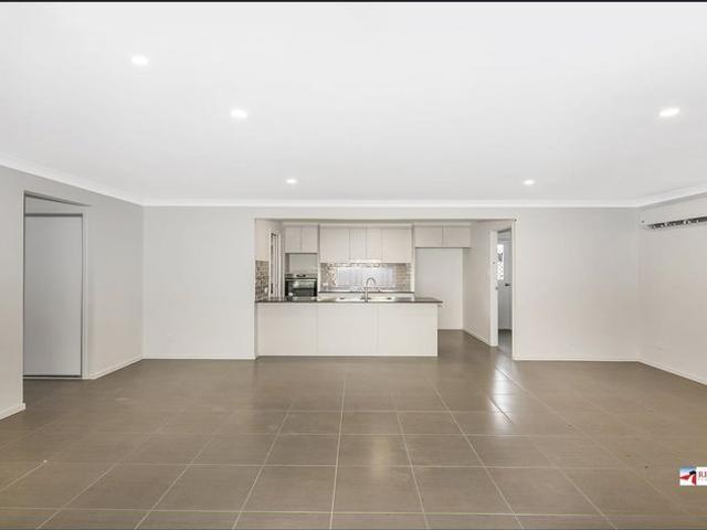 QUALITY FITENI HOME IN CENTRAL REDLAND BAY