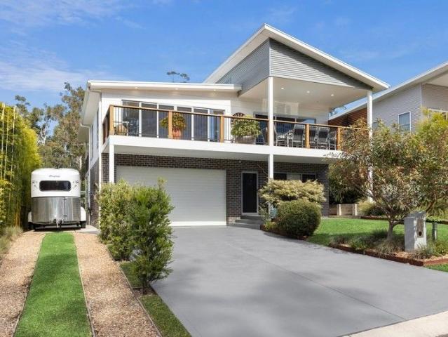 Quality home North Bendalong with water glimpses