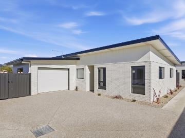 Quality, low maintenance unit in quiet locale