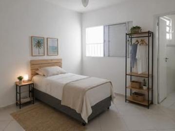 Quarto individual 500 metros praia