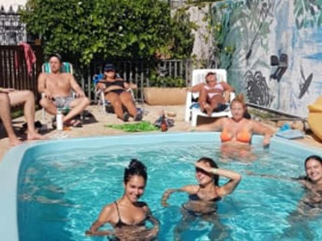 Quarto privado em hostel com piscina no centro da Lagoa
