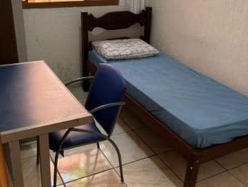 Quartos individuais em casa no Bairro Nova Suiça
