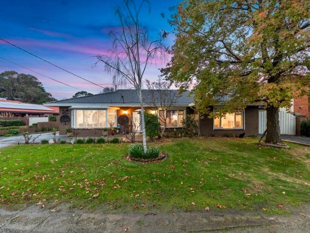 QUARTER ACRE WITH SHED AND SIDE ACCESS!