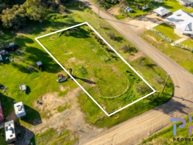 QUARTER ACRE, TITLED, RELATIVELY FLAT AND BUSHLAND VIEWS