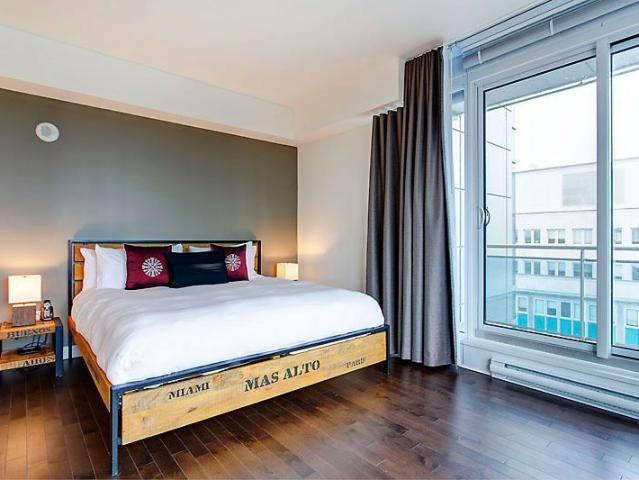 Quartier de Spectacles Montreal Furnished Condo Rental at Le V Gorgeous Studio Rental with Hardwood Floors and Balcony