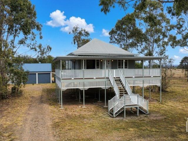 QUEENSLANDER CHARM ON 4.94 ACRES, WITH SHED & DAM