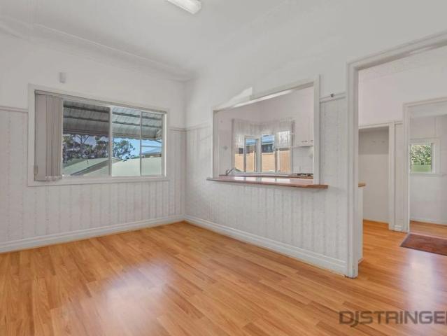 QUEENSLANDER RIVERSIDE RESIDENCE
