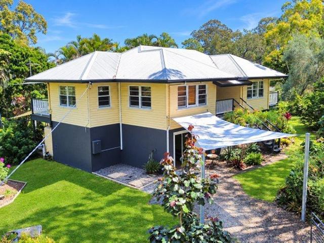 Queenslander with Water Glimpses and Dual Living Potential