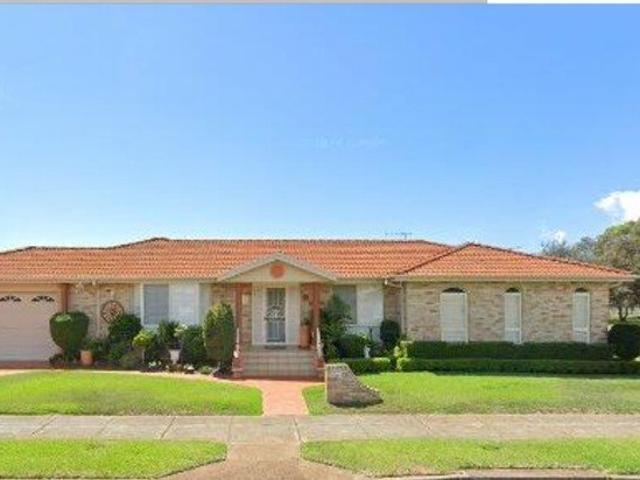 QUIET,yet centrally located brick and tile open plan family home in Banksia Gardens Estate,Tuncurry NSW