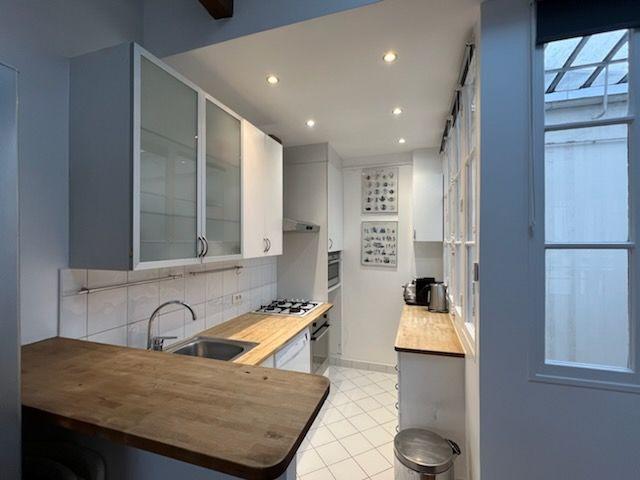 Quiet air conditioned duplex with two separate bedrooms – between the Opera and Louvre, historic district, Paris Amsterdam Apartments for Rent