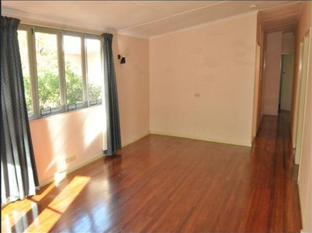 QUIET, AIR CONDITIONED, POLISHED FLOORS THROUGHOUT, 3 LARGE BEDROOMS