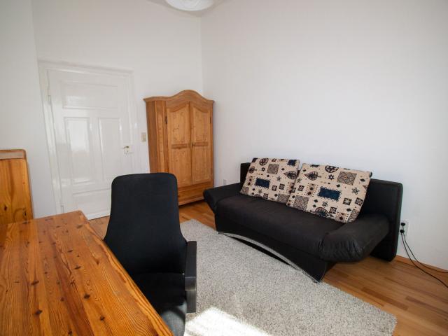 Quiet and charming apartment in central city location with southside view