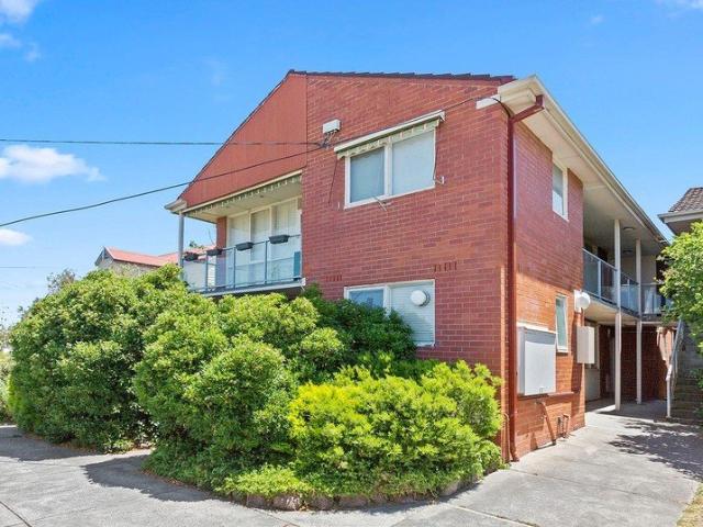 QUIET AND PRIVATE GROUND LEVEL WITH YARD!
