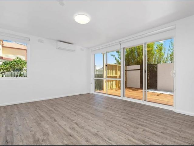 QUIET AND PRIVATE GROUND LEVEL WITH YARD!
