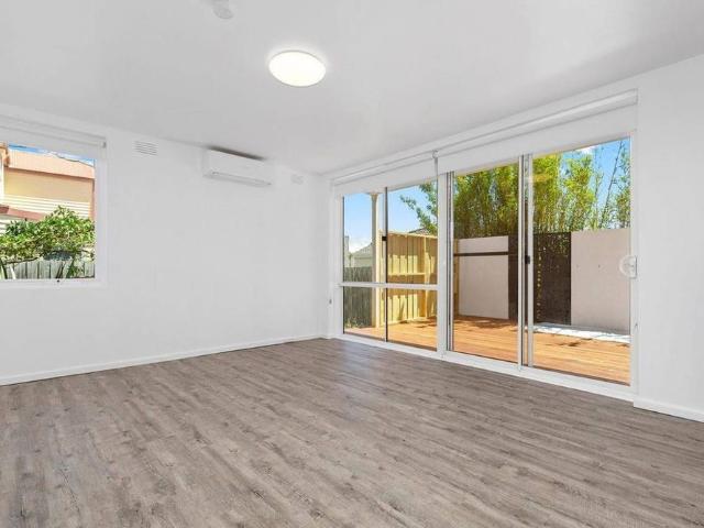 QUIET AND PRIVATE GROUND LEVEL WITH YARD!