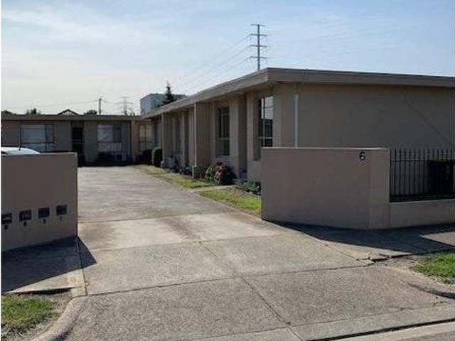 Quiet & Convenient Low Maintenance Unit in a Prime Location