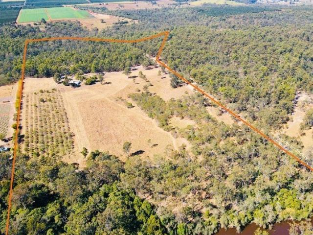 QUIET COUNTRY LIVING ON 66 ACRES