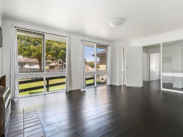 Quiet Court Living: Freshly Painted Home with Large Yard
