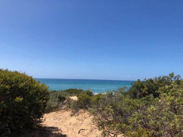 Quiet flat block close to the beach