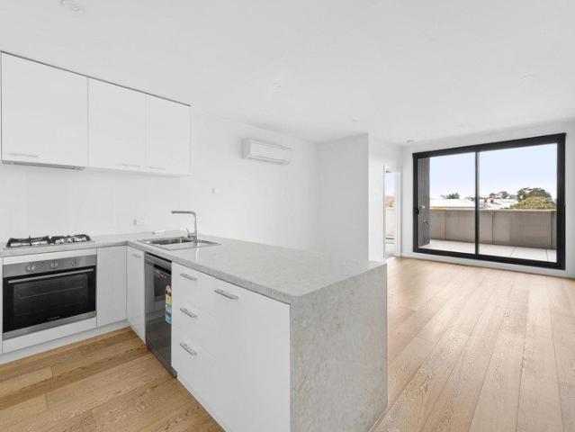 Quiet, light filled Living with an expansive north facing Balcony