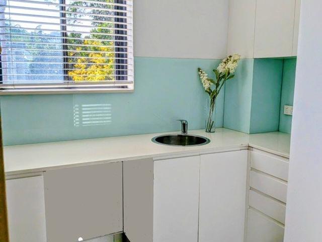 Quiet studio apartment with lockup garage in excellent location