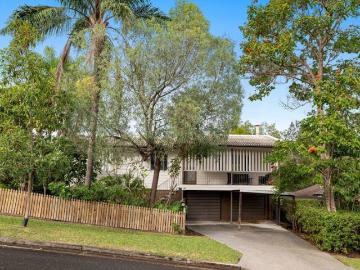 Quietly elevated, naturally inviting substantial highset home, steps to cafes, shops, Toohey Reserve