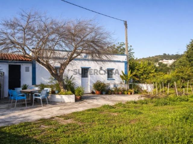Quinta com Casa Térrea T3, T1 e Terreno em Santa Catarina, Tavira