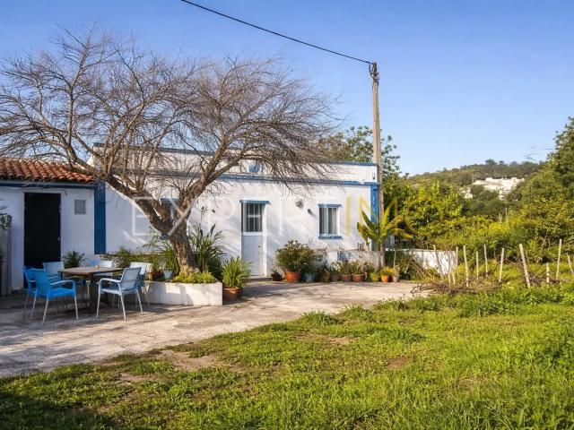 Quinta com Casa Térrea T3, T1 e Terreno em Santa Catarina, Tavira