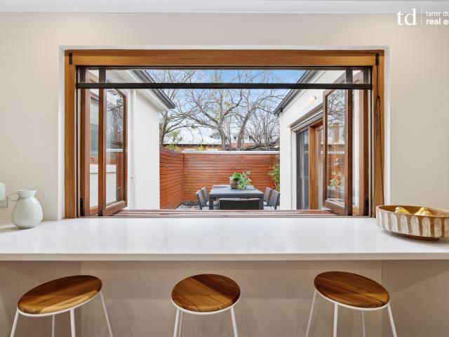 Quintessential Double Fronted Cottage in Kensington with modern rear extension