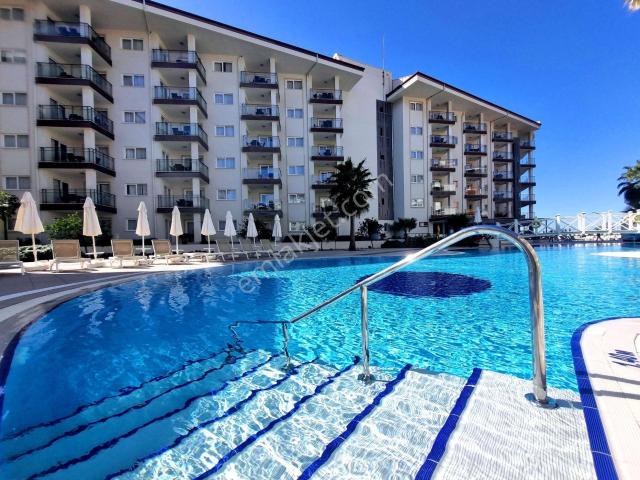 Ramada Hotel'de Full Eşyalı Havuz Manzaralı 1+1 Daire Satılık