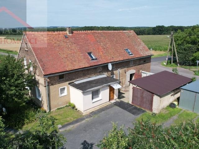 Przestronny dom 120 m2 z garażami i dużą działką