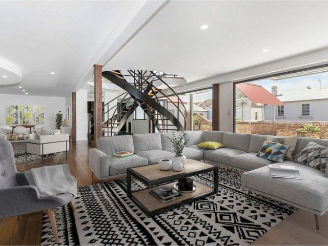 RARE MULTI LEVEL RESIDENCE WITH SEVEN BEDROOMS IN PREMIUM BEACHSIDE LOCATION