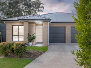 Rare Opportunity Secure One or Both Sides of This Stylish and Spacious Duplex!